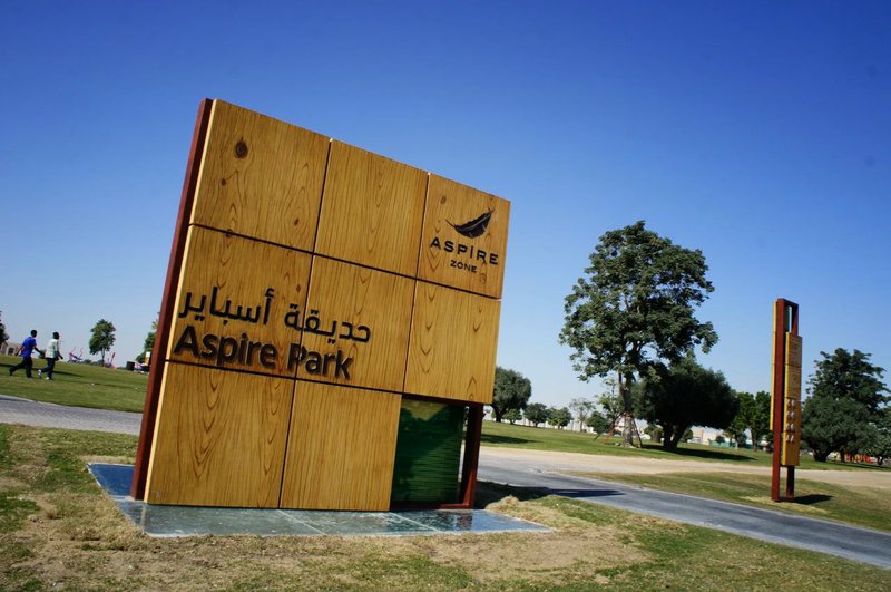 Aspire zone wooden signage