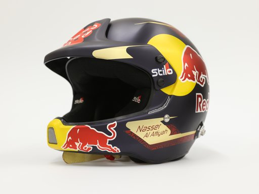 A race helmet with the name Nasser Al Attiyah stapled to its side