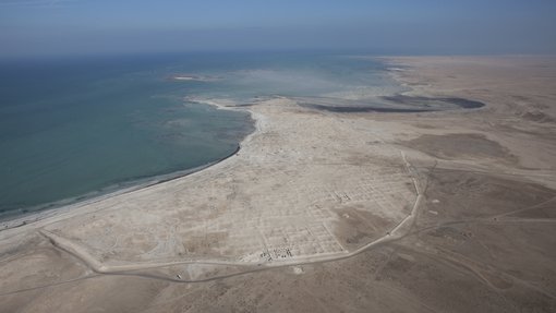 An aerial view of the Al Zubarah heritage site located right next to the coast