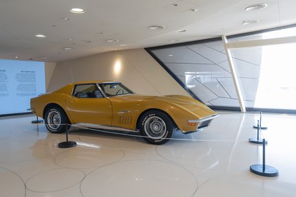 A shot of a yellow Chevrolet Corvette 1972 model at the Mawater Gallery, NMoQ  CORVETTE 1972