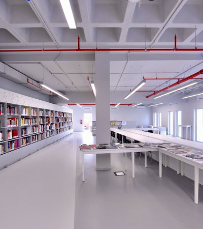 Interior view of Mathaf's library with book shelving and seating area