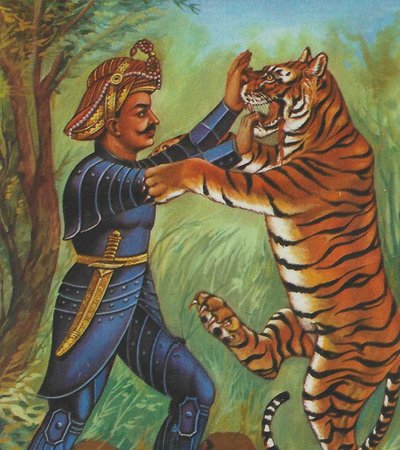 Image of a man fighting a tiger.